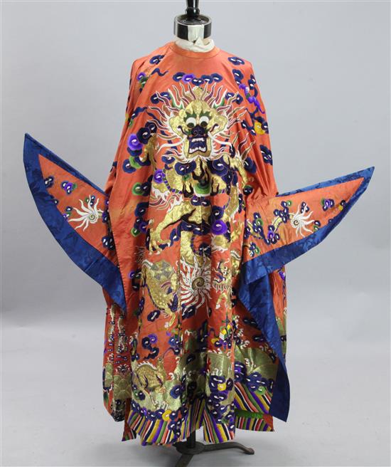 A Chinese embroidered silk and metal thread dragon theatrical robe, early 20th century, length 121cm